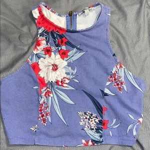 purple crop top with zipper down the back.
